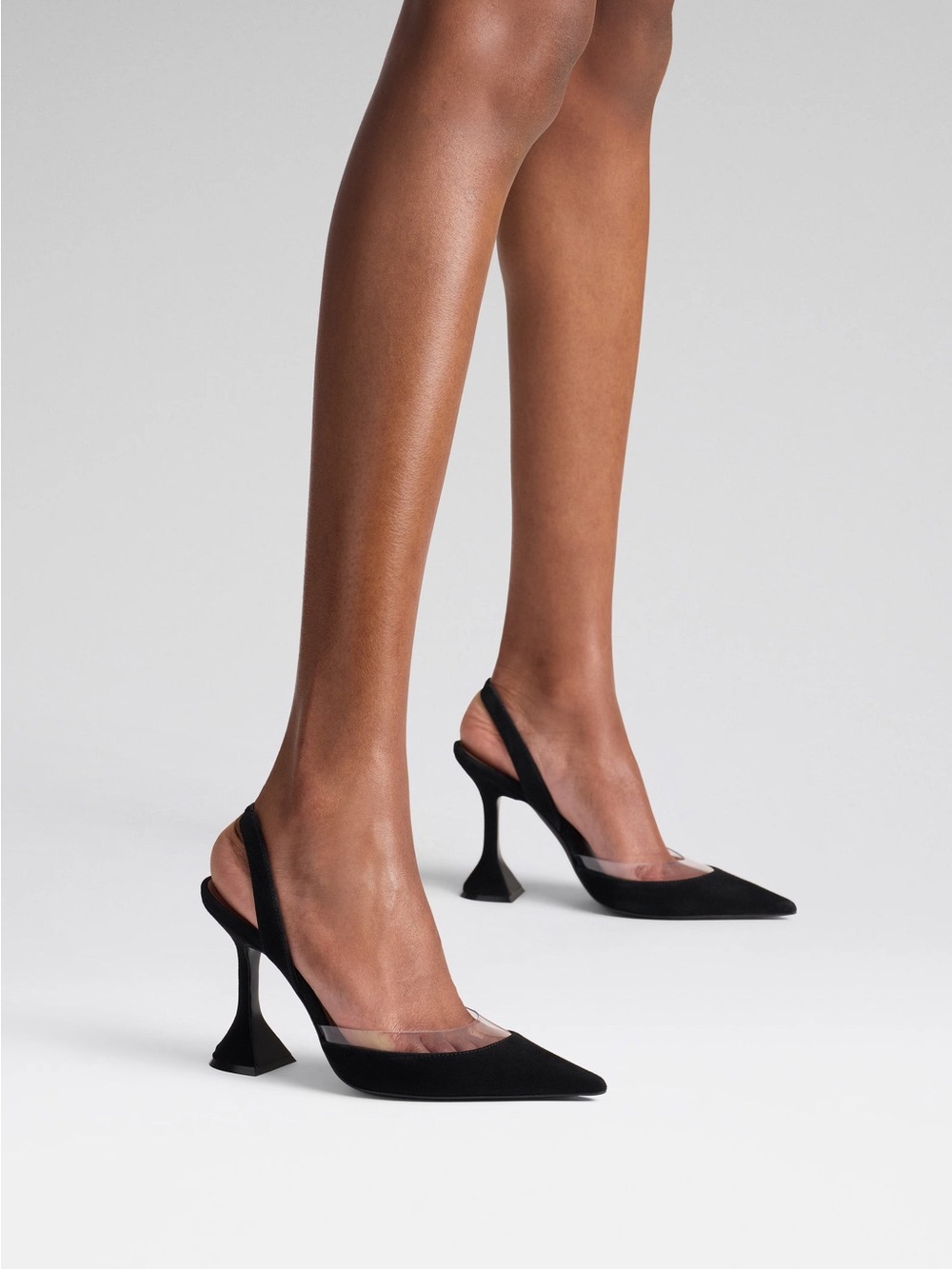 Pointed Navy Slingback Heels with Sculptured Flared Heel.
